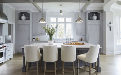custom built white contemporary-medieval style kitchen and dining room